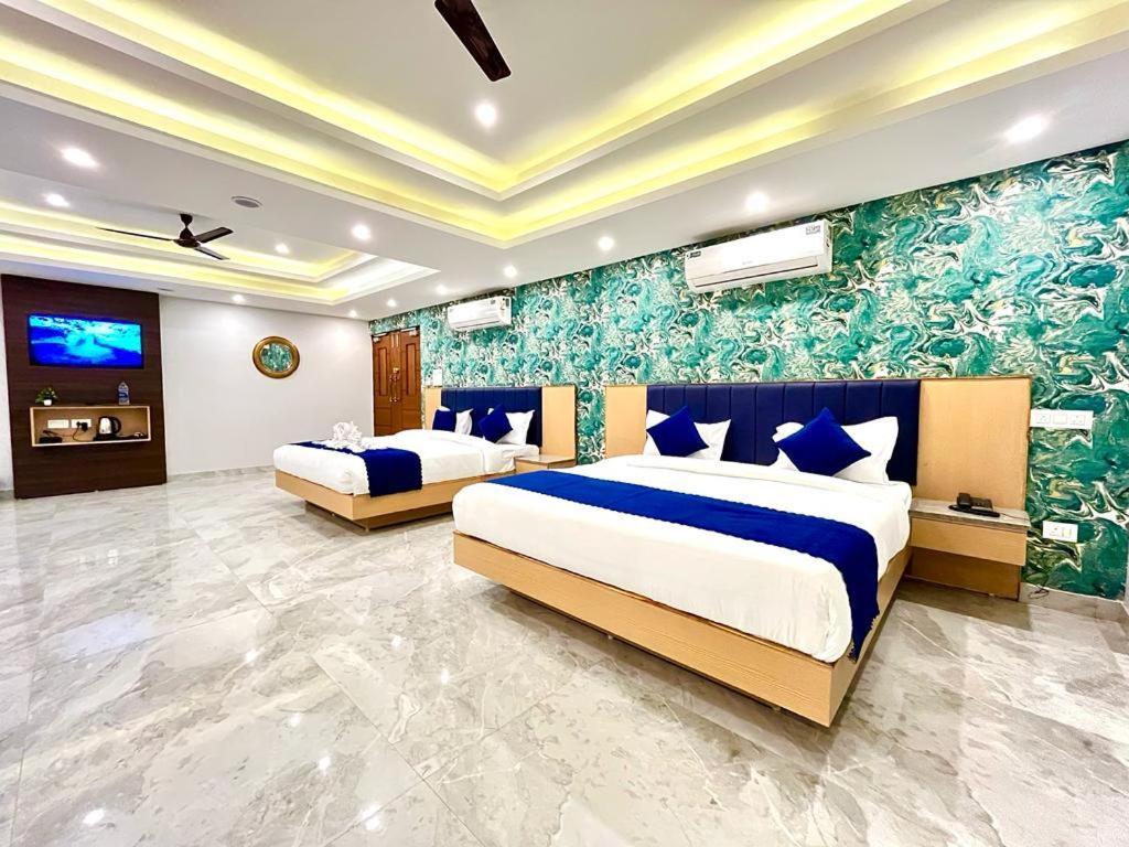 The Eleganza Hotel Jhajra Exterior photo